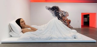 Installation view, 'Air', Gallery of Modern Art featuring in bed 2005 by Ron Mueck, England, b.1958 and Plume 20 2022 by Jemima Wyman, Pairrebeener people, Australia b.1977 / © The artists or their representatives





