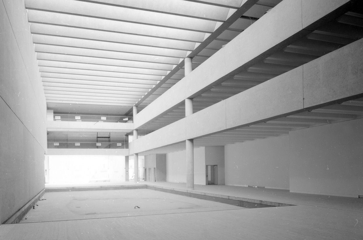 The Watermall looking toward the Cafe entrance through to the Sculpture Courtyard while the Queensland Art Gallery building was still under construction / Collection: QAGOMA Research Library