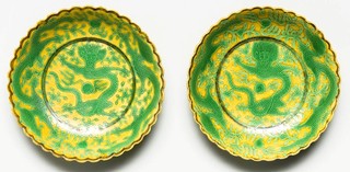 Unknown, China / Pair of imperial dragon dishes 1875–1908 (Guanqxu period) Porcelain, yellow and green glaze, scalloped rims / 3 x 13.3cm (diam.); 2.9 x 13cm (diam.) / Gift of an anonymous donor through the Queensland Art Gallery Foundation 2012. Donated through the Australian Government's Cultural Gifts Program / Collection: Queensland Art Gallery | Gallery of Modern Art