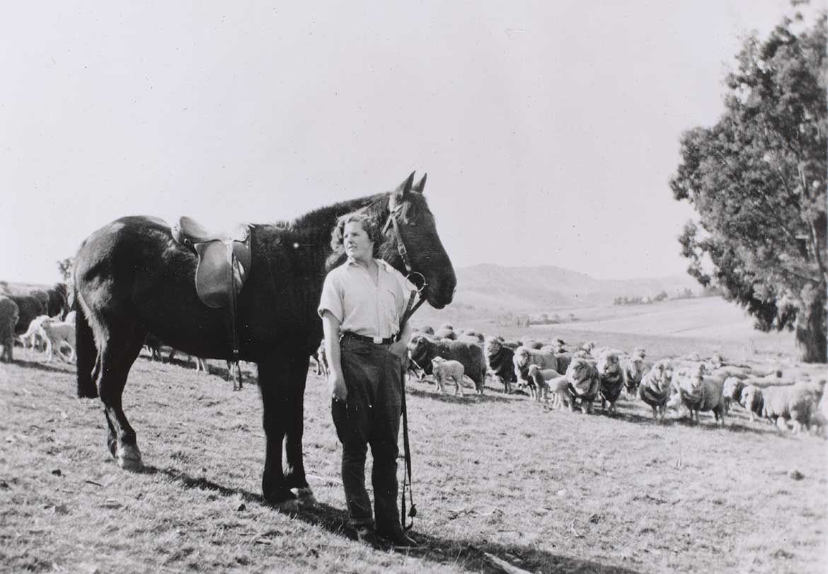 Nance Edgley posing for The fair musterer / Black and white photograph by Hilda Rix Nicholas / Rix Nicholas Archive, Delegate, NSW