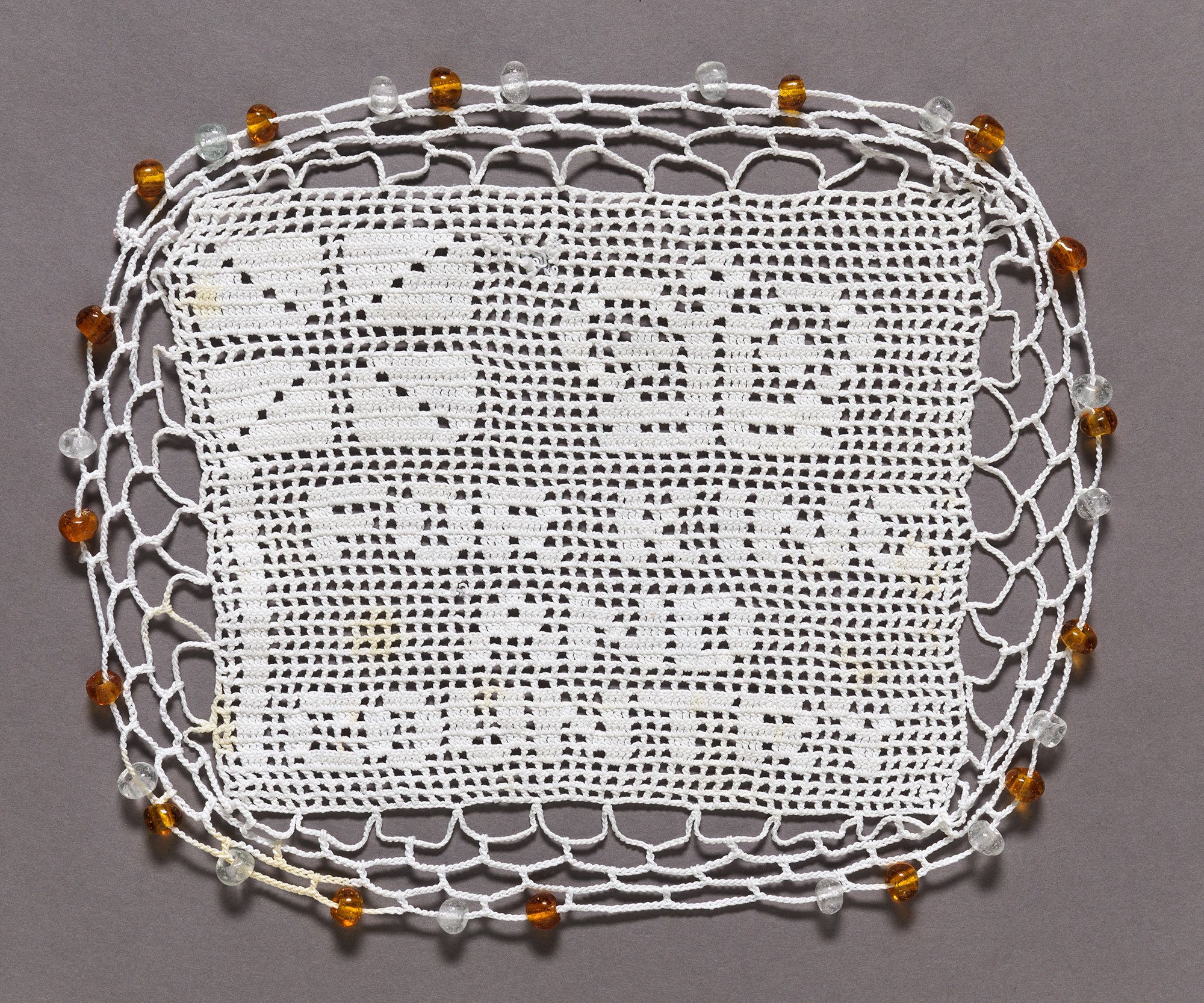 Unknown, Australia / (For King and Country) c.1914 / Cotton filet crochet with glass beads / 21 x 25cm / Gift of Penny Greig through the QAGOMA Foundation 2013 / Collection: Queensland Art Gallery | Gallery of Modern Art