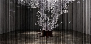 Chiharu Shiota / Japan b. 1972 / Installation view of A question of perspective 2022 in 'The Soul Trembles', Gallery of Modern Art, Brisbane / Polypropylene ropes, 80mg paper, found table and chair, cable ties, staples / 500 x 810 x 1215cm / Photograph: Natasha Harth, QAGOMA 