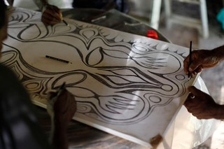 Kwoma artists working on drawing by Nelson Makamoi, Ilahita, painting workshop, July 2011 | Photograph: © Richard Kendall