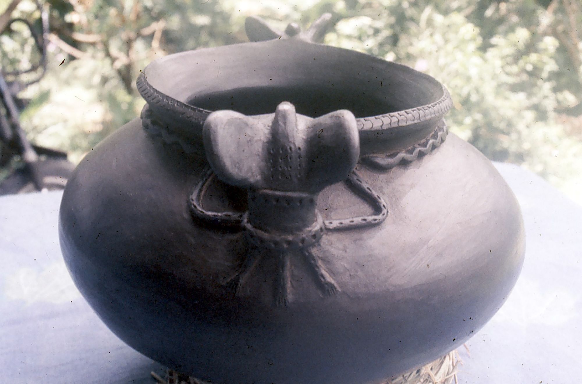 Joyce Mary Savinaja Gole OL, Papua New Guinea 1941-2025 / Bat pot / Hand-thrown earthenware with incised decoration and beeswax / © Joyce Mary Aresepa Gole, OL Estate / Photograph: David Gole