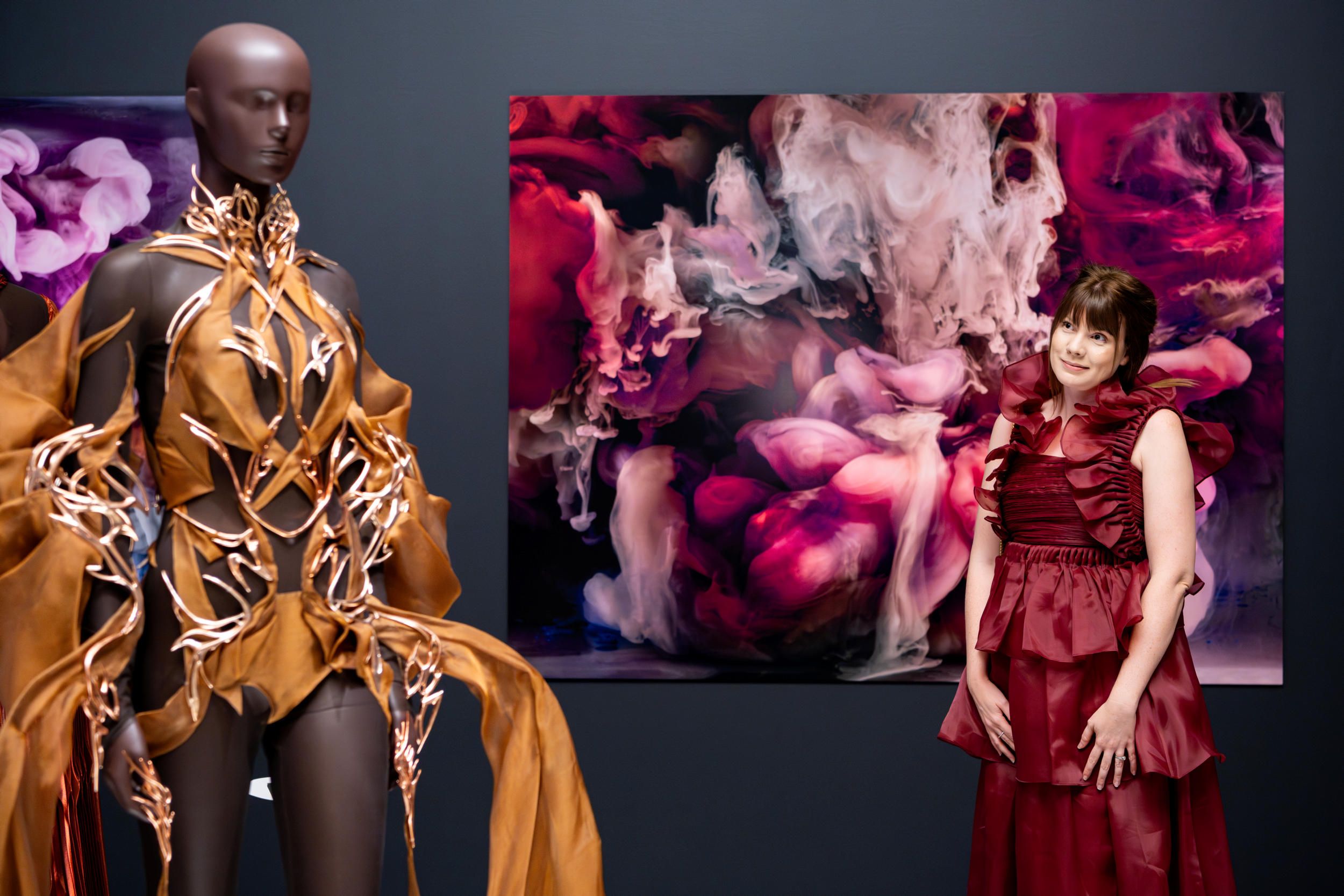 Patron enjoying art within Iris van Herpen: Sculpting the Senses / June, 2024 / Gallery of Modern Art, Brisbane / Photography: C. Callistemon, QAGOMA