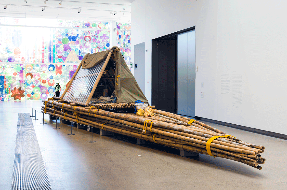 Salote Tawale, Fiji/Australia b.1976 / No Location 2021 / Bamboo, nylon rope, cotton, polycarbonate sheeting, tarpaulin and found objects / 300 x 240 x 1350cm (approx.) / Commissioned for ‘The 10th Asia Pacific Triennial of Contemporary Art (APT10). Purchased 2021 with funds from the Jennifer Taylor Bequest through the Queensland Art Gallery l Gallery of Modern Art Foundation / Collection: Queensland Art Gallery | Gallery of Modern Art, Brisbane / Photograph: N. Harth © QAGOMA / This project has been assisted by the Australian Government through the Australia Council, its arts funding and advisory body, and the Visual Arts and Craft Strategy, an initiative of the Australian State and Territory Governments. Salote Tawale is an Associate Lecturer at the University of Sydney.