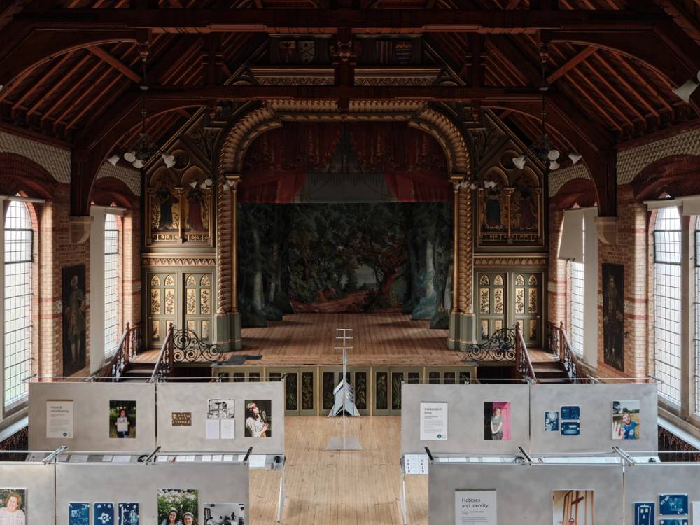 A photograph of an exhibition within a grand hall