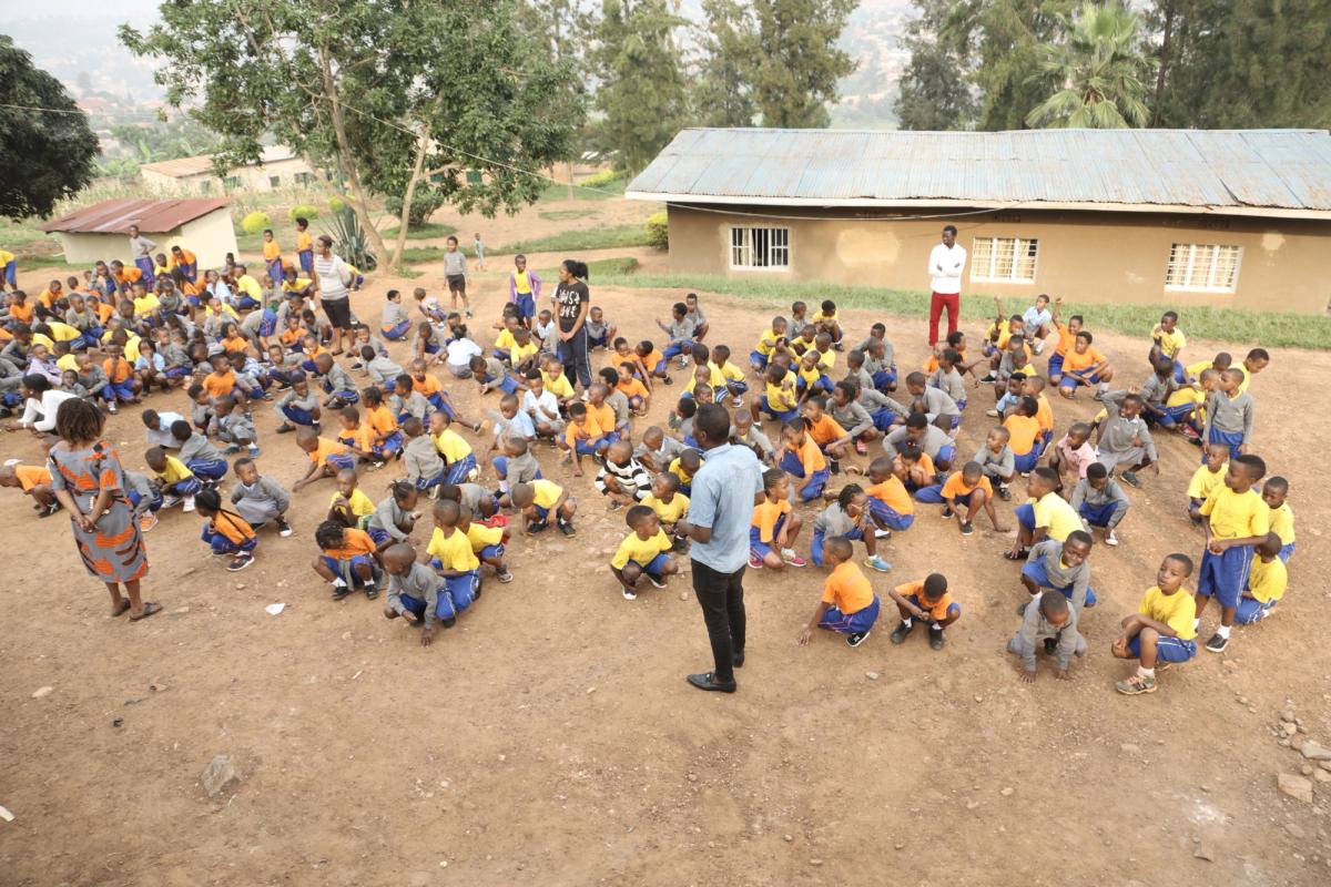 A community landscape evoking the founder's birthplace in Rwanda's western region