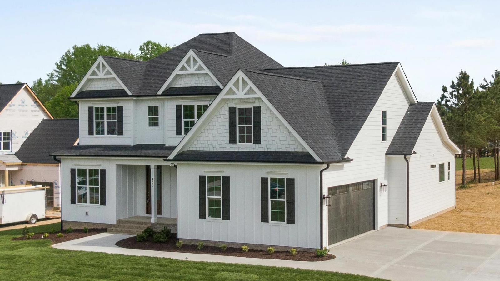 Minneapolis home with a newly installed architectural asphalt shingle roof showcasing modern residential roofing craftsmanship.