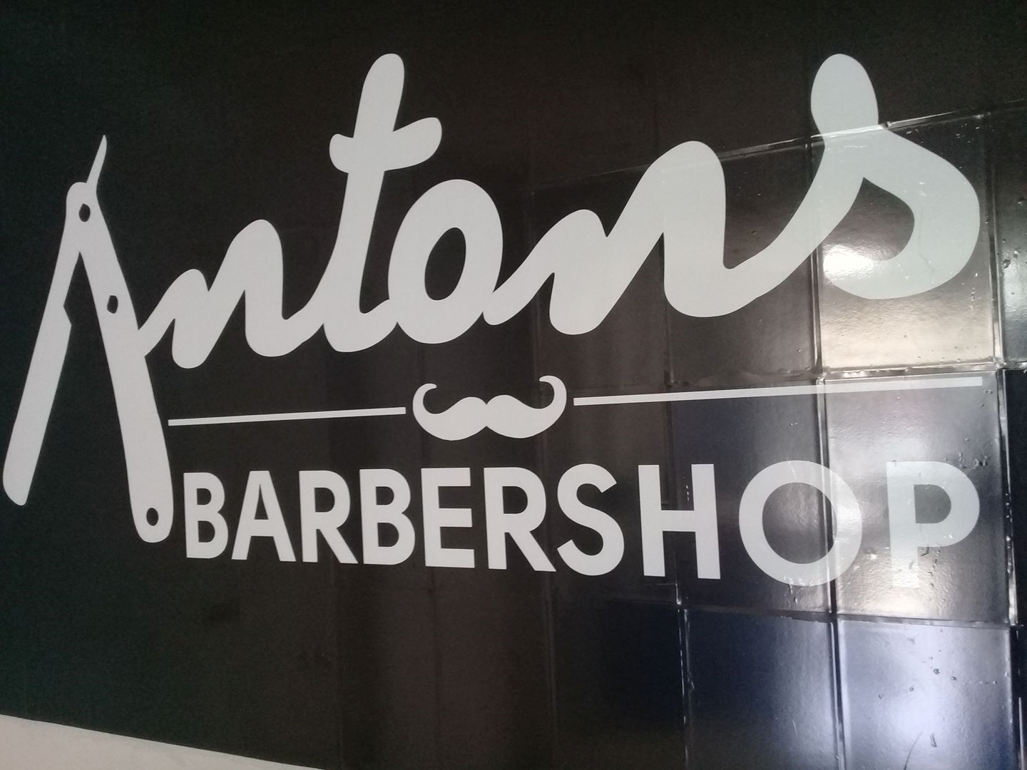 Antons Barber Shop logo