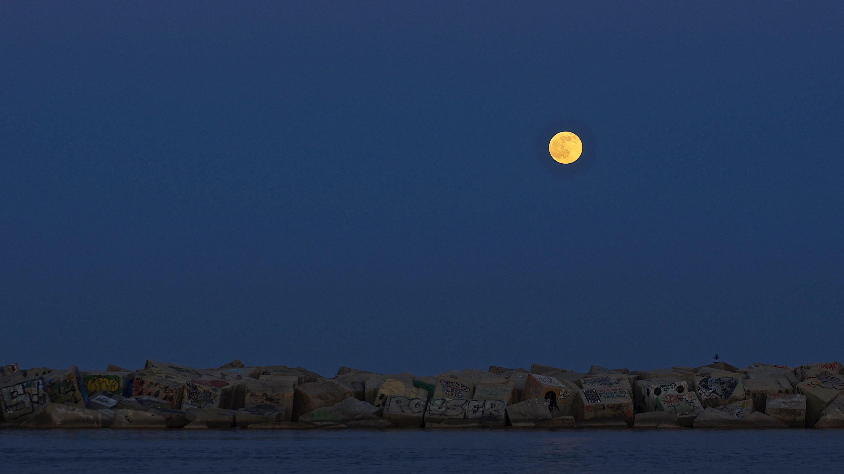 Moon by the sea
