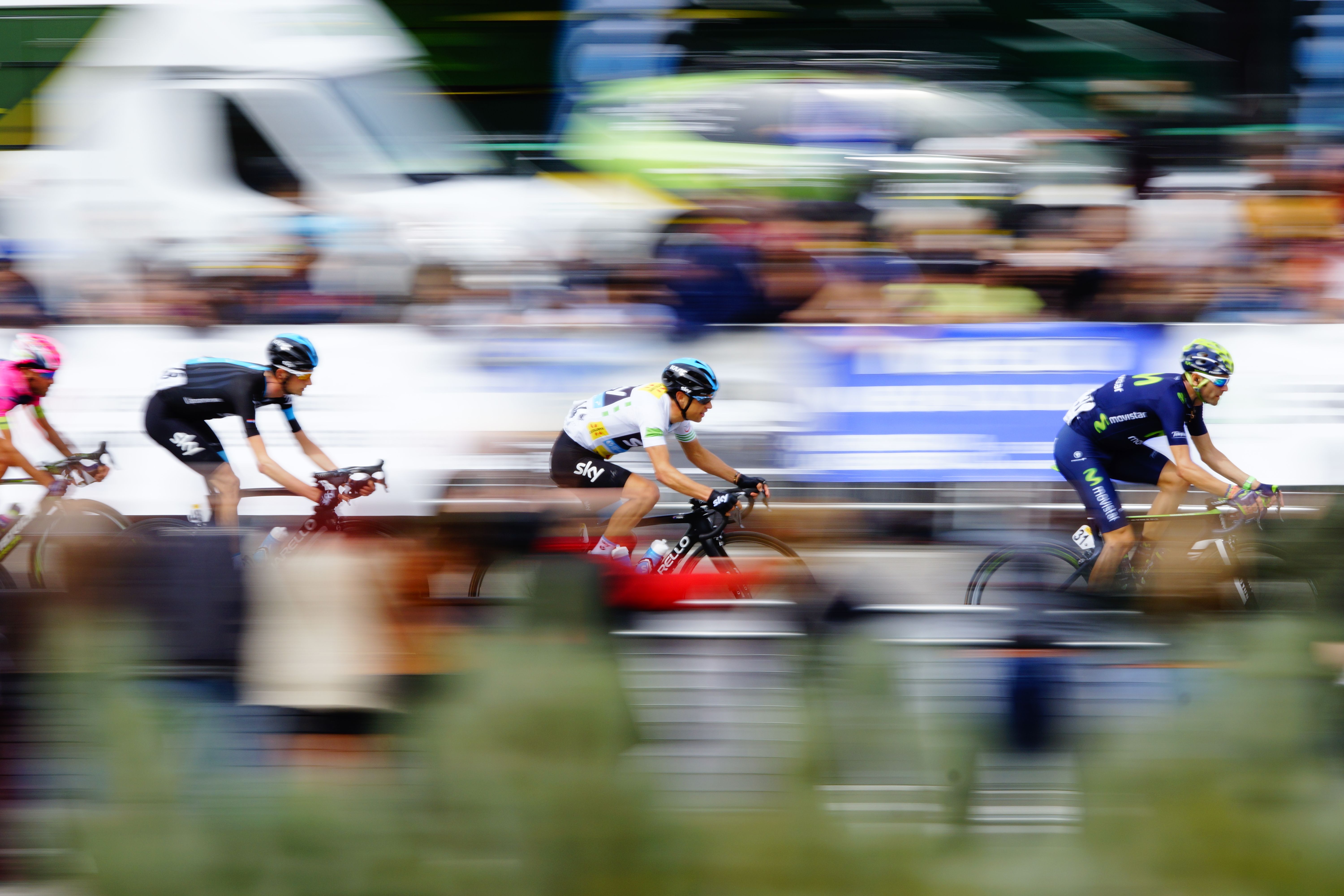 3 cyclists sprinting