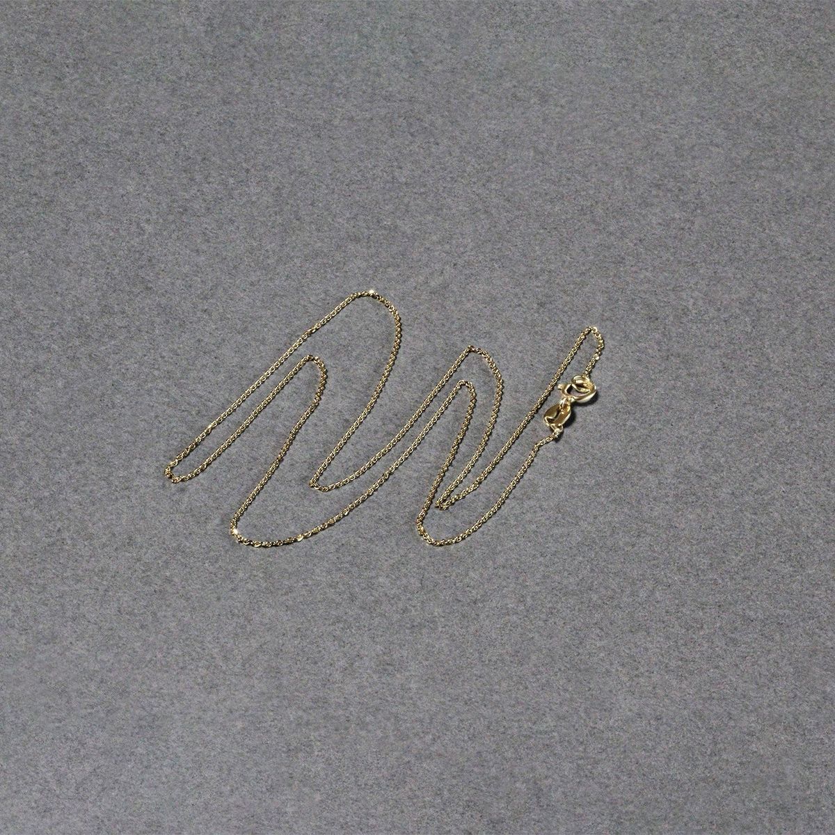 14k Yellow Gold Diamond Cut Cable Link Chain (0.68 mm) thumbnail 5