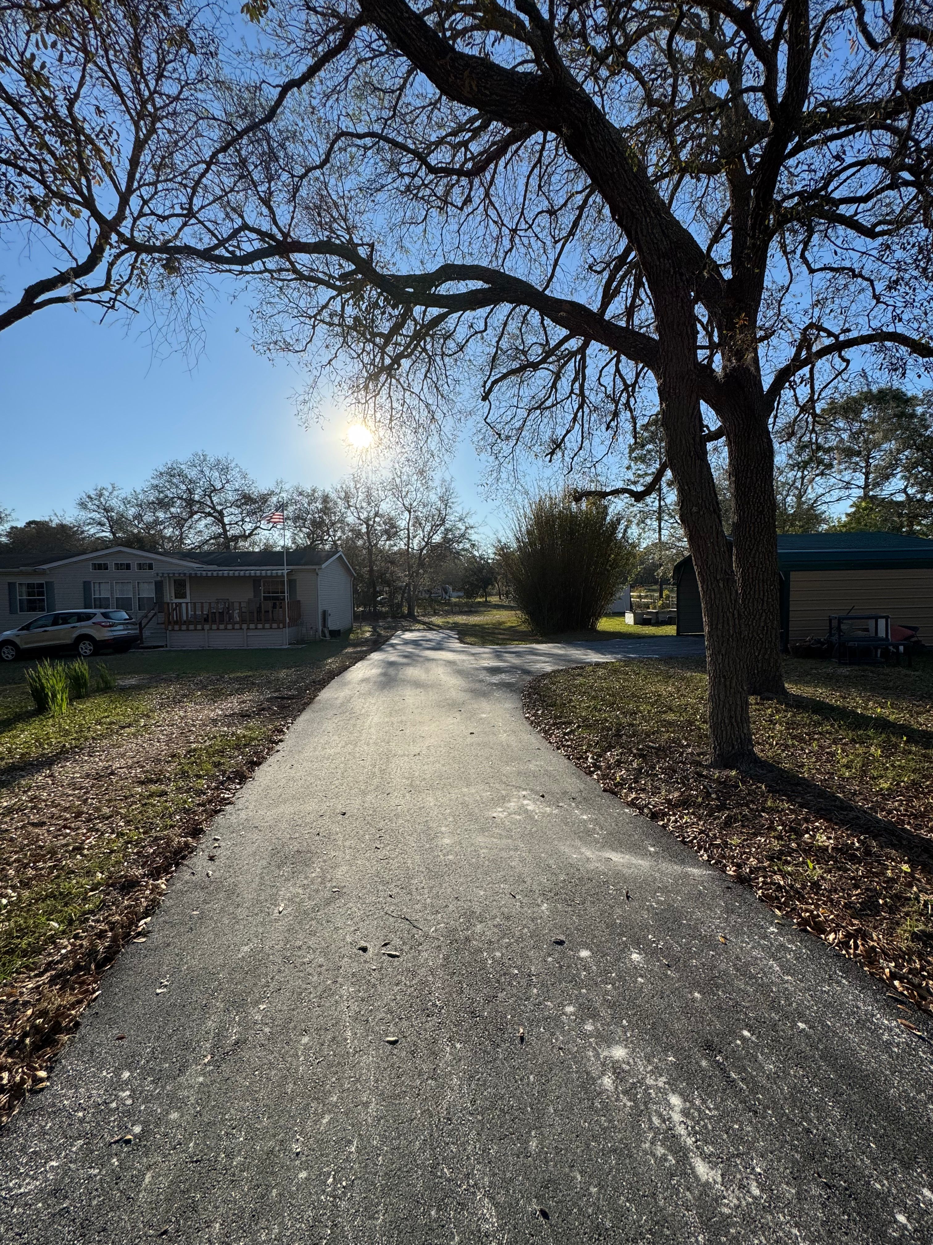 Asphalt millings and driveway paving — view 2