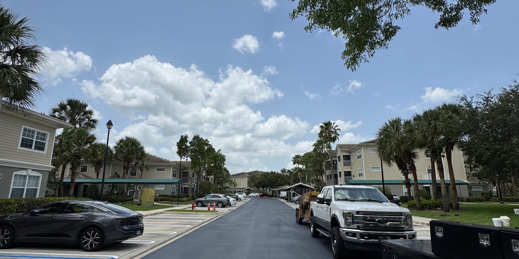 Finished asphalt road through a managed residential community