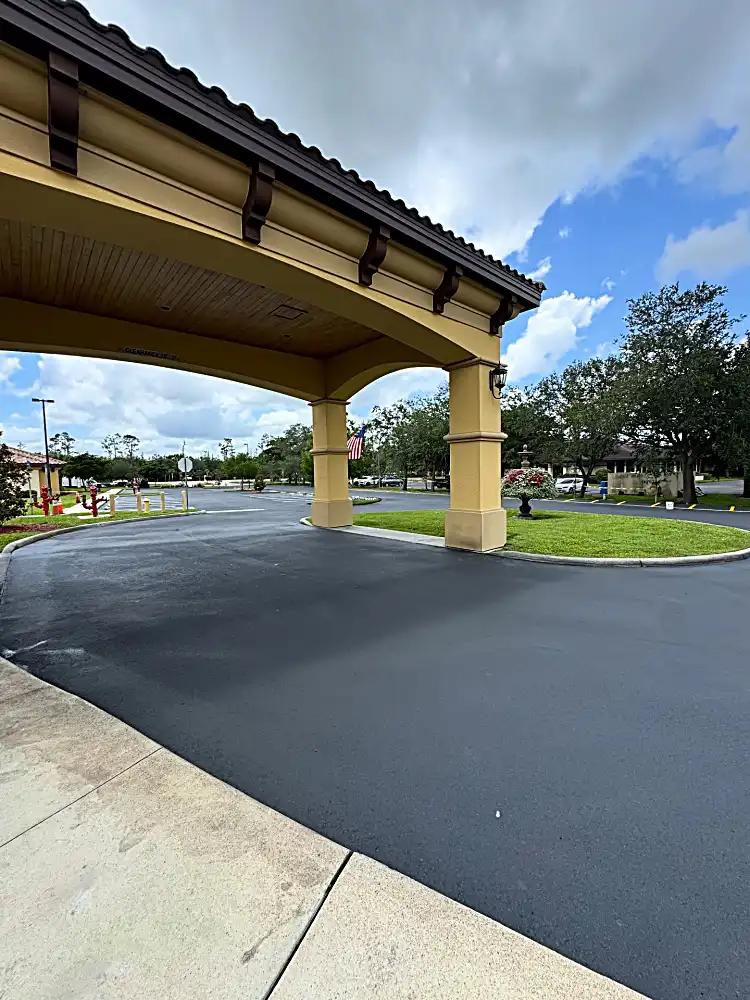 Covered entrance area with fresh pavement