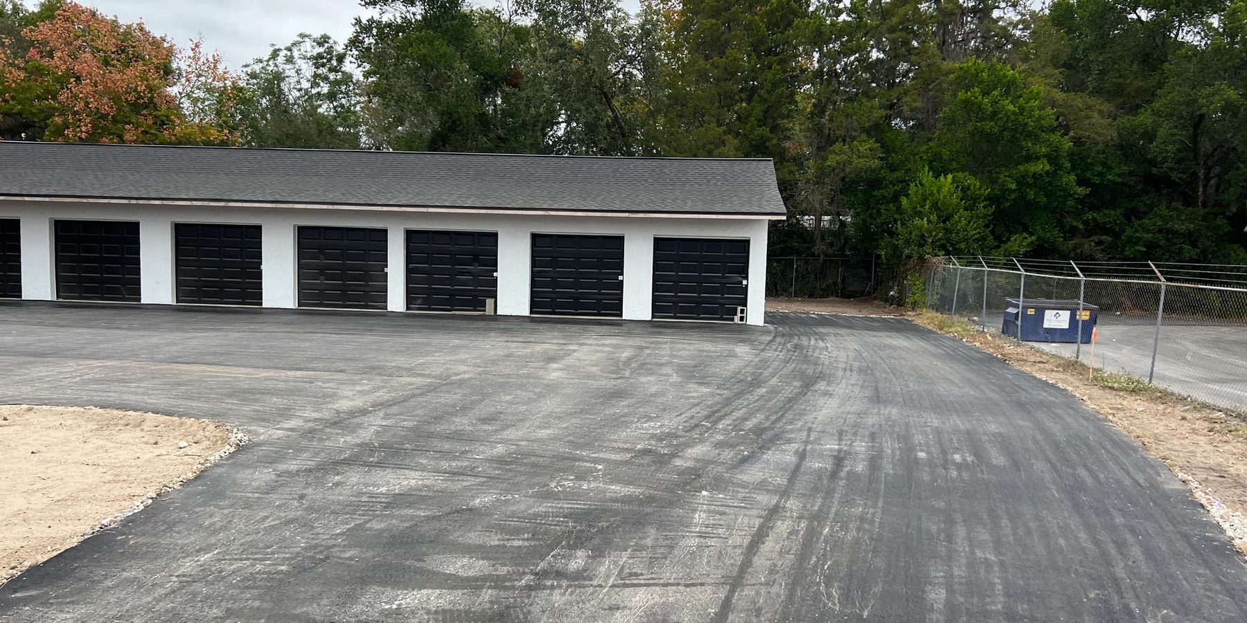 Prepared pavement area in front of self-storage buildings