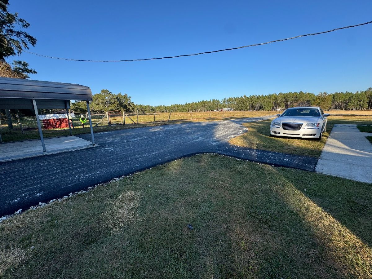 Completed residential driveway with smooth road surface