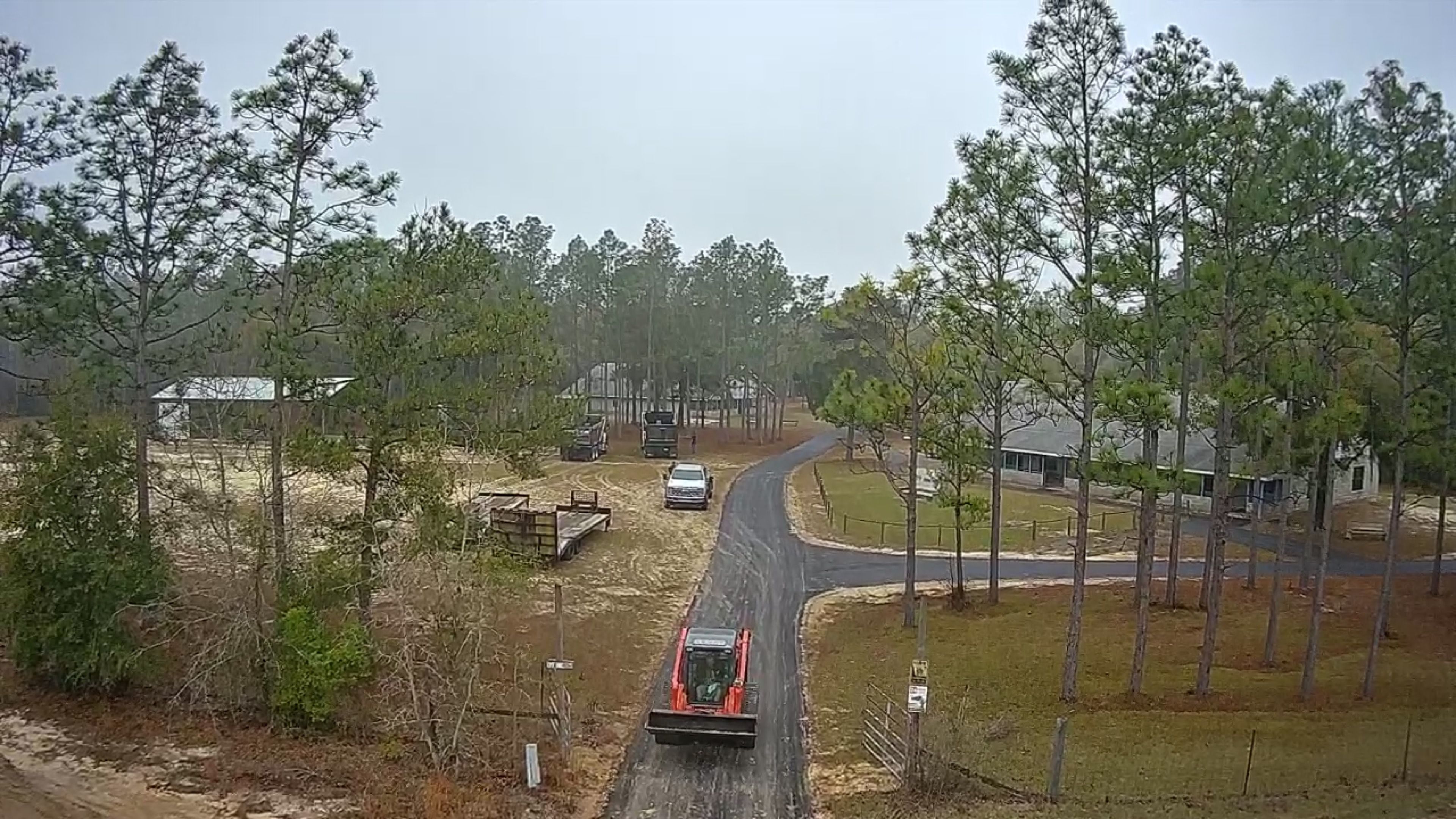 Aerial view of a newly paved private driveway