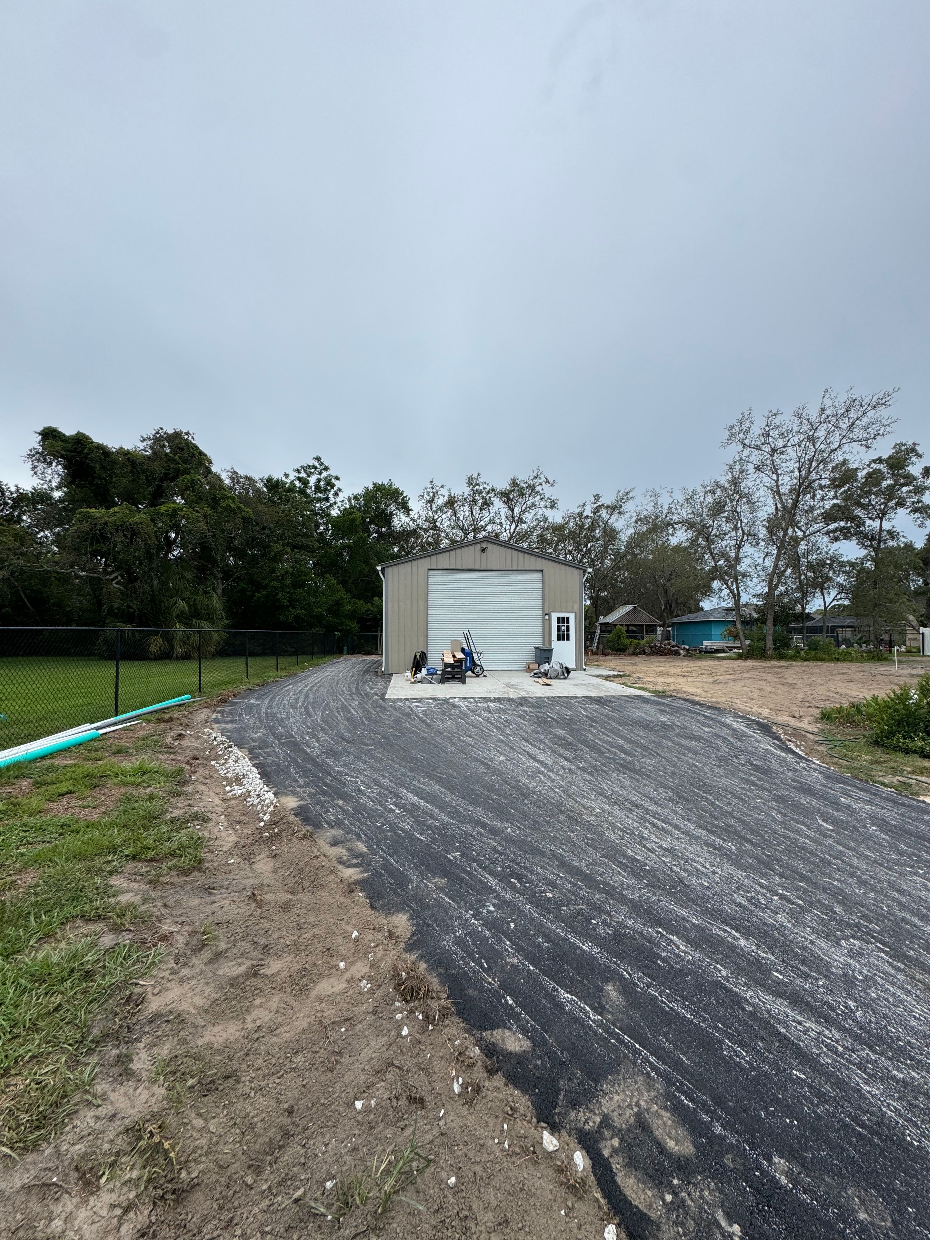 Driveway surfacing in progress at a residential property