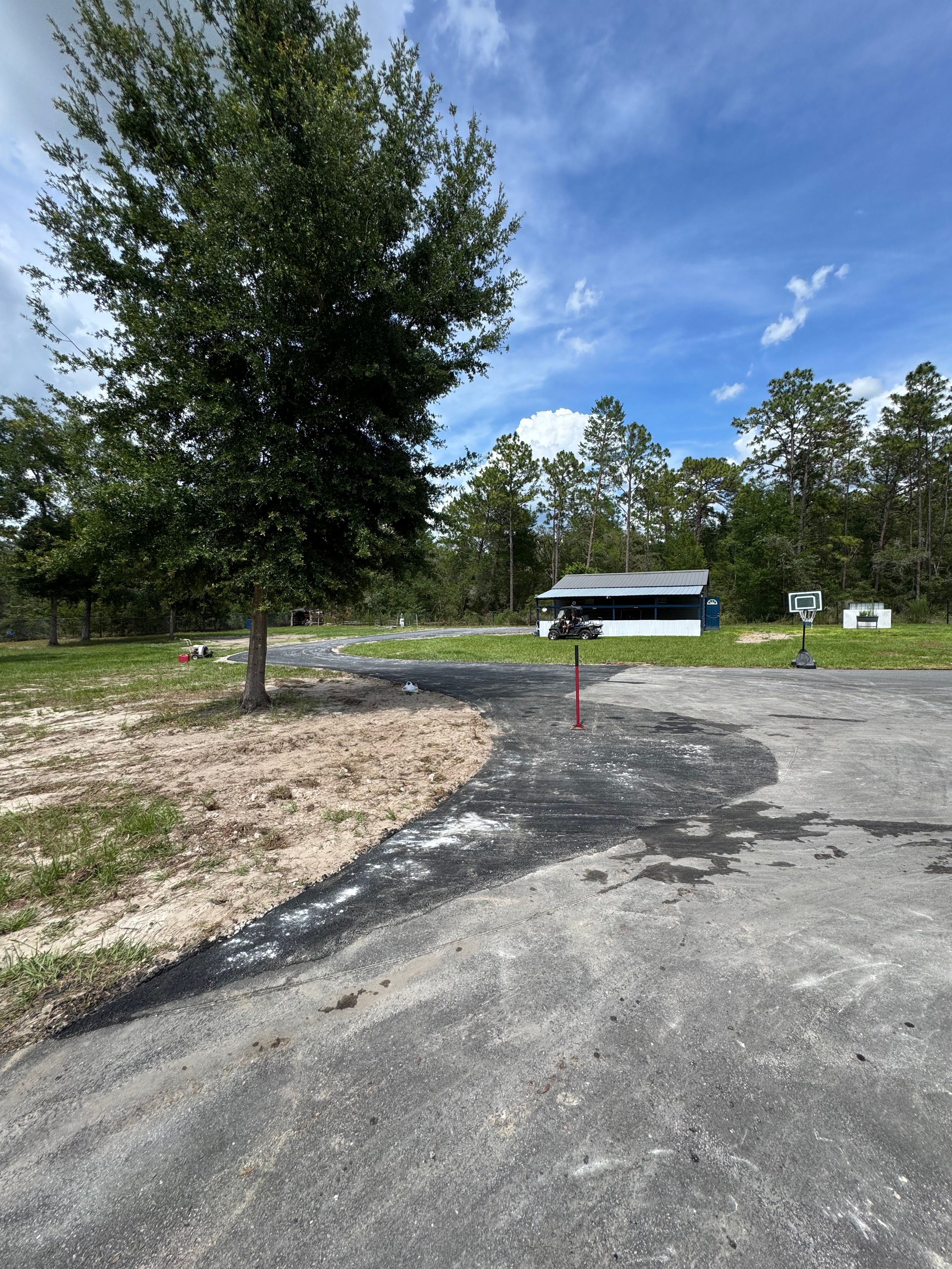 Site preparation and private-road paving — view 1