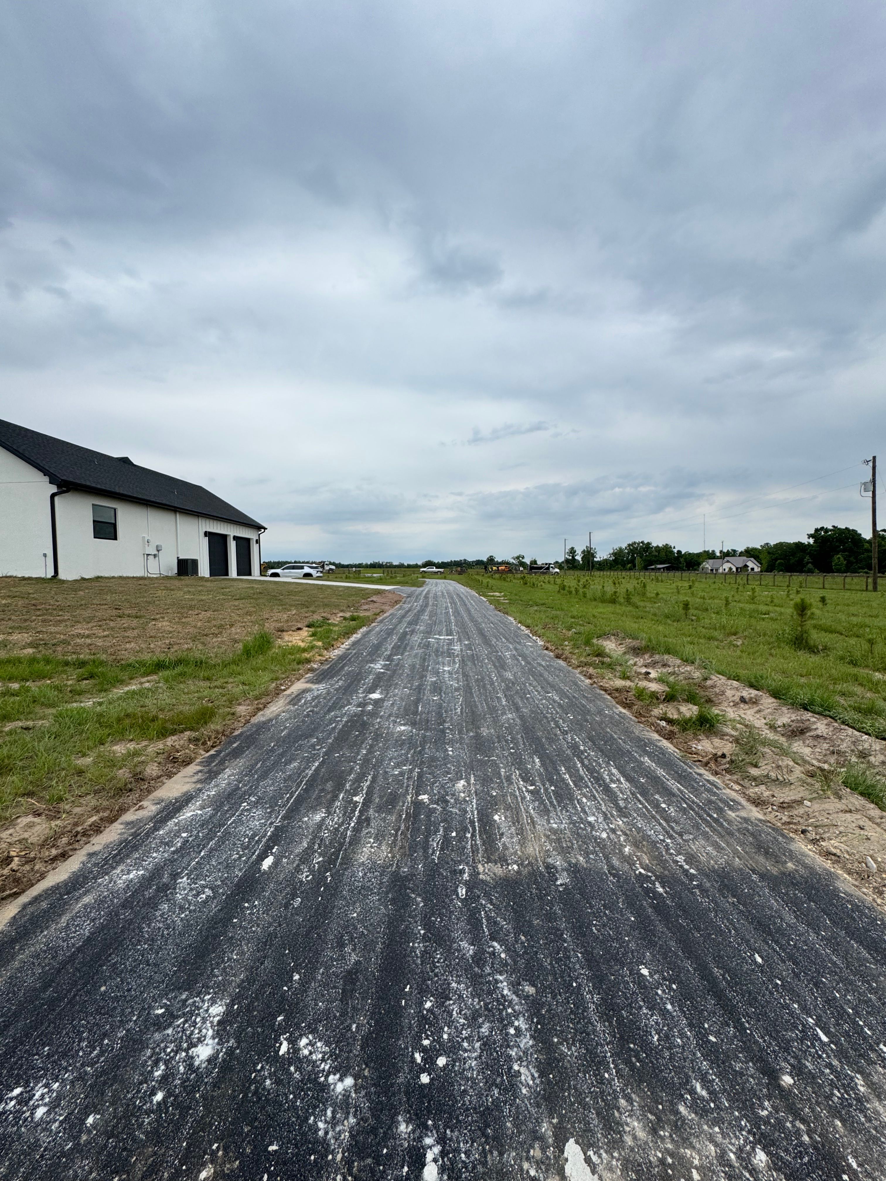 Driveway installation and asphalt millings — view 2