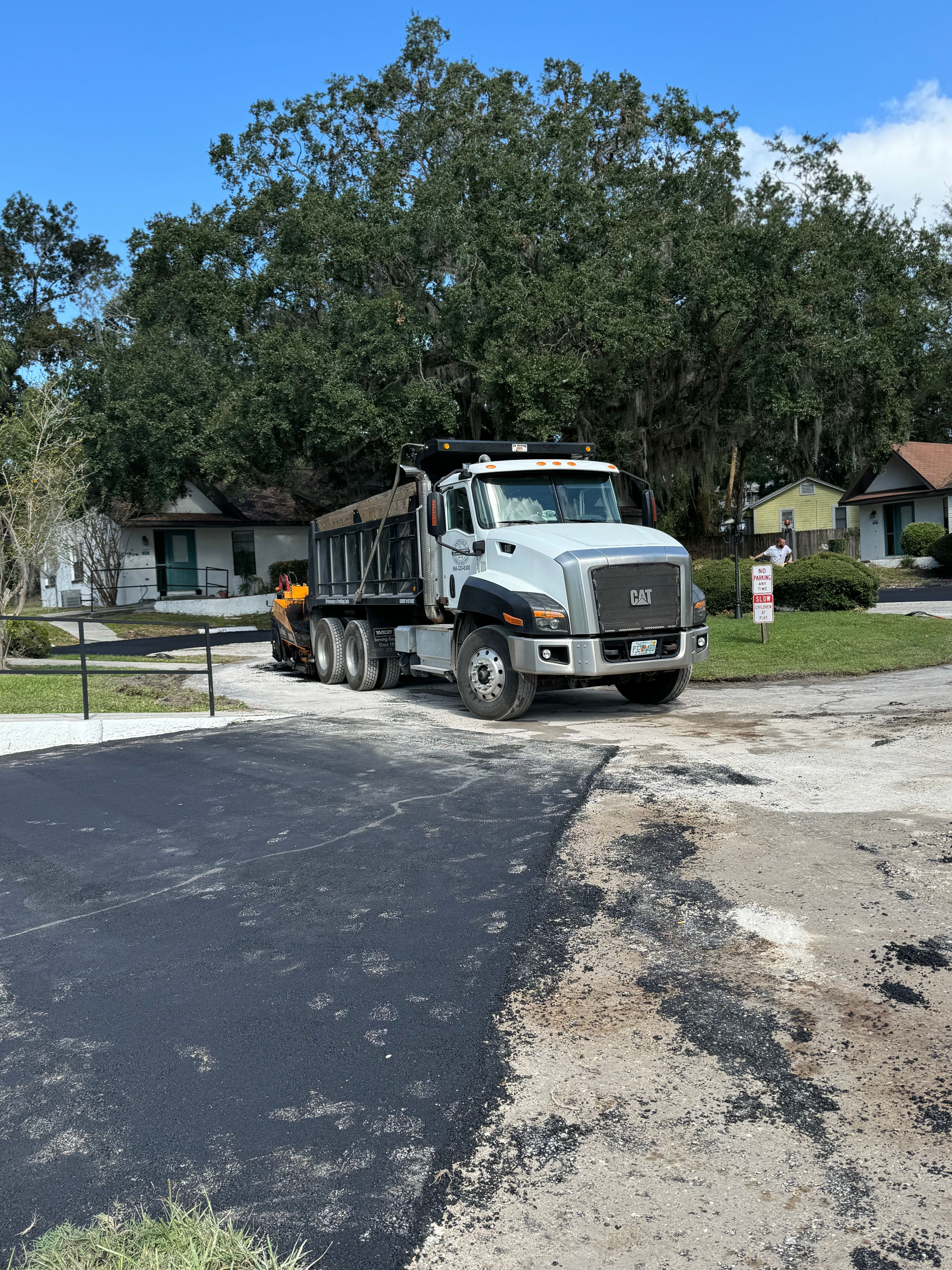 Street or private-road maintenance, asphalt repair and paving — view 2