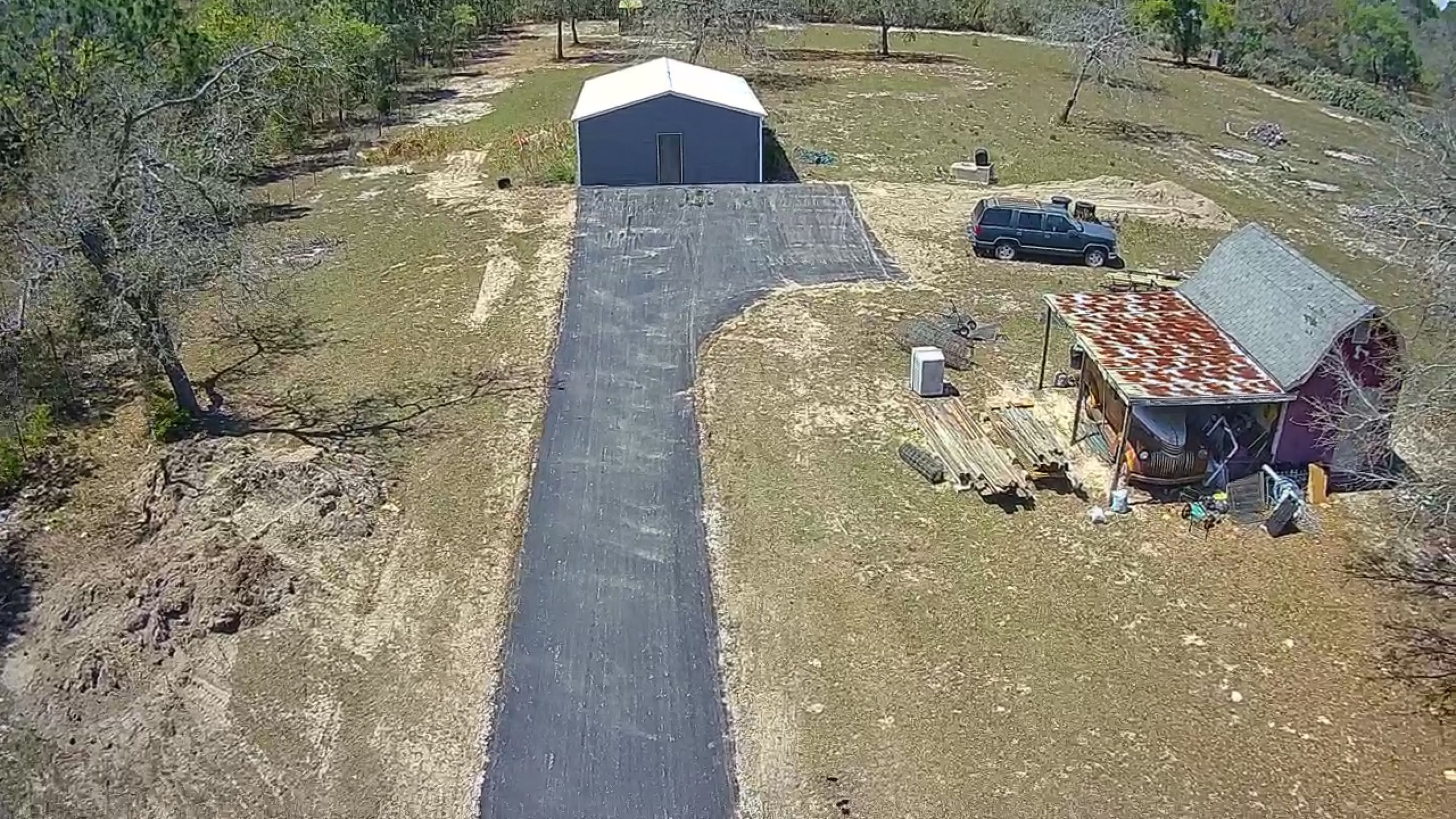 Asphalt driveway and apron completed at a detached building