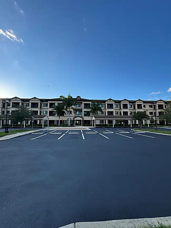 Building facade with fresh pavement