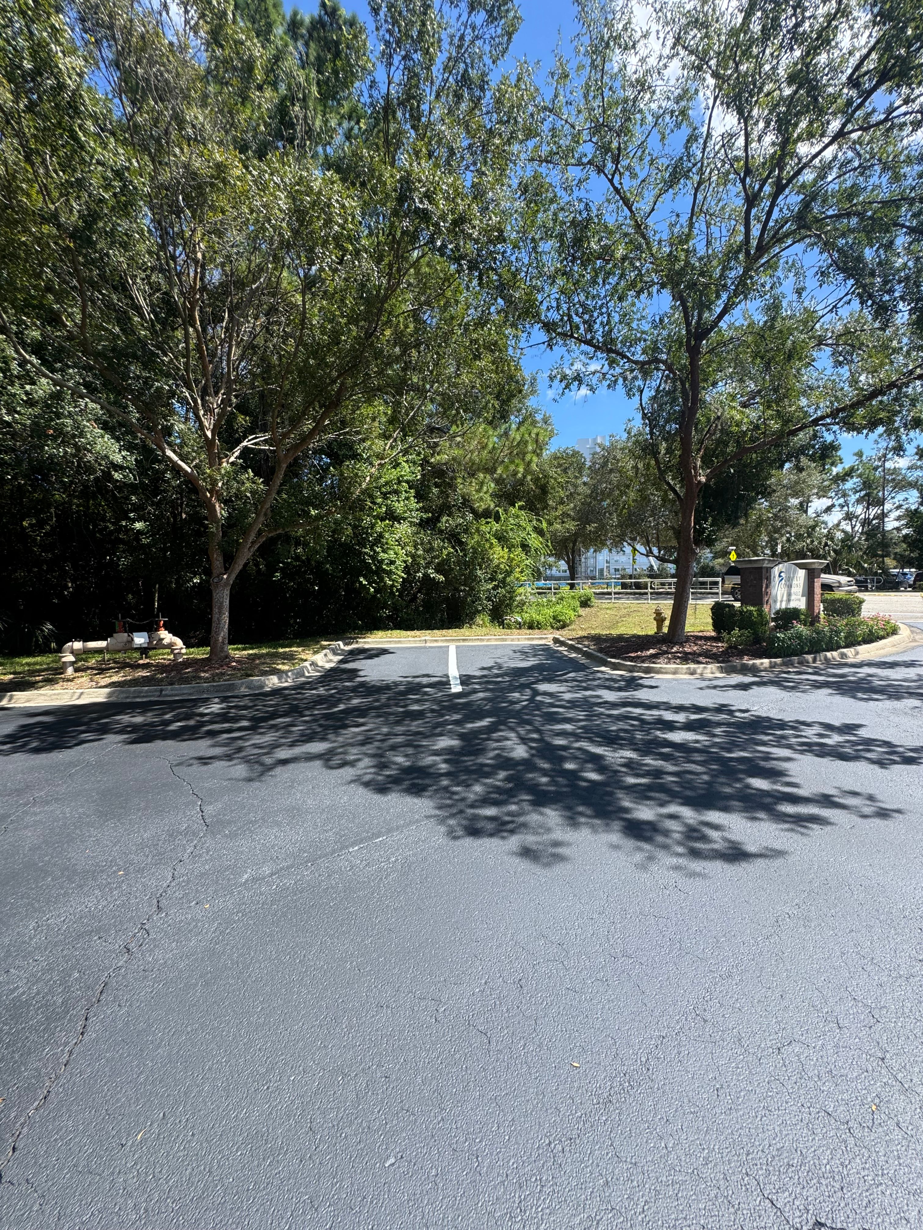 Completed asphalt parking area at a managed property