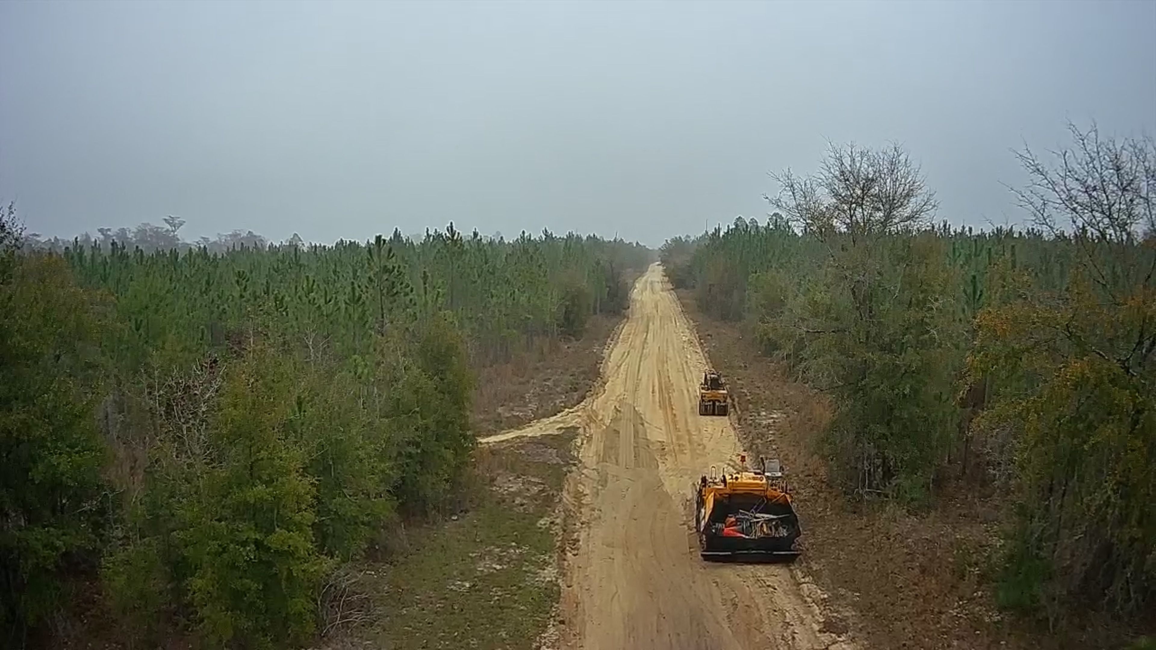 Long unpaved private drive before asphalt installation