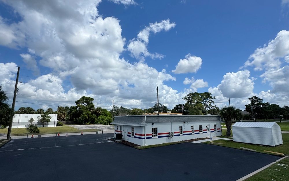 Dark sealed asphalt surface at a commercial property