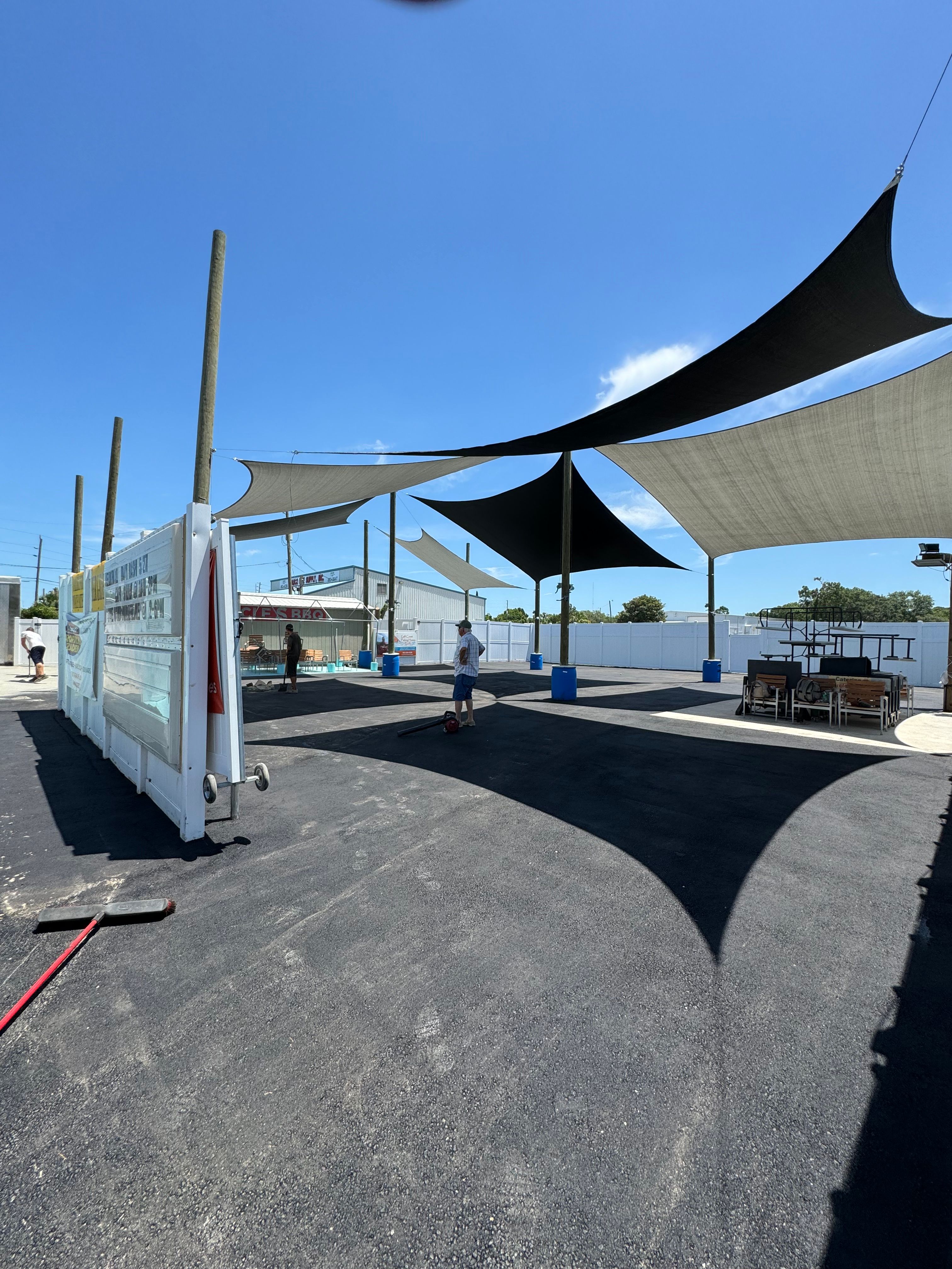 Wide view of completed asphalt at a covered commercial facility