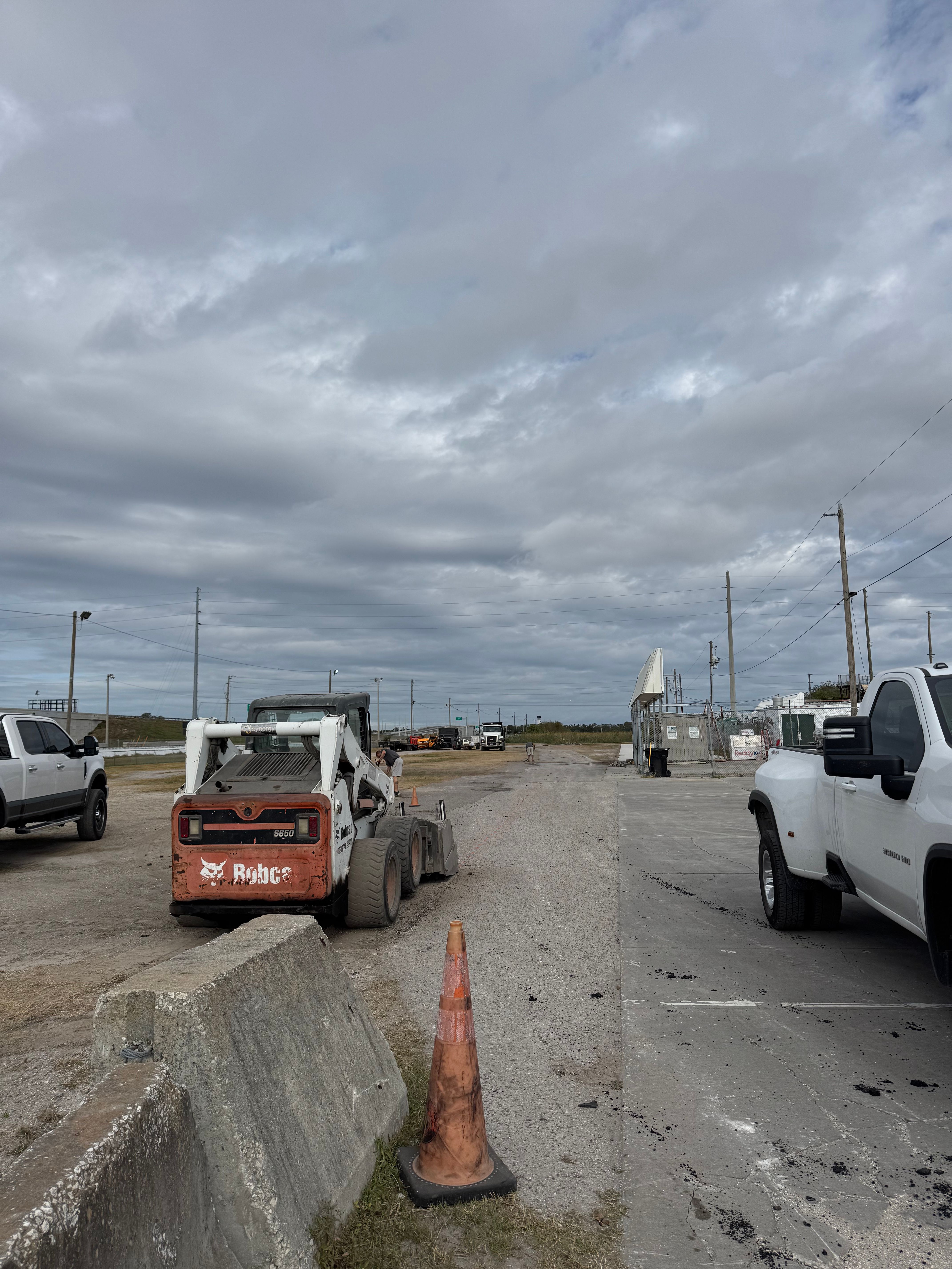 Surfaced access road serving an industrial property