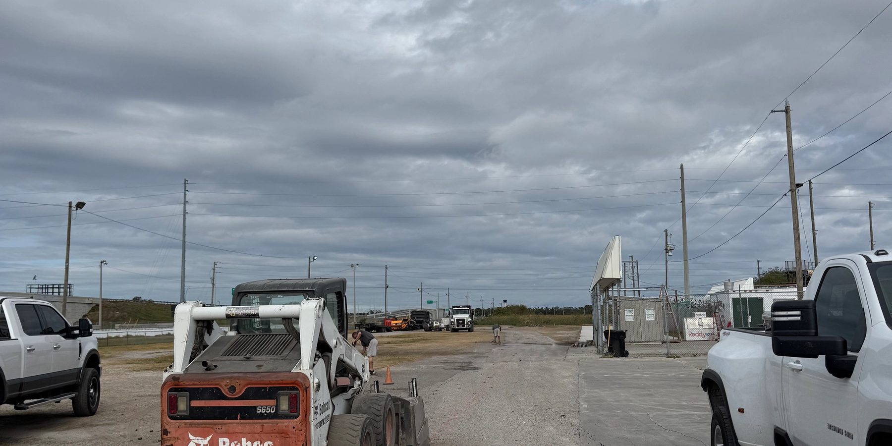 Surfaced access road serving an industrial property