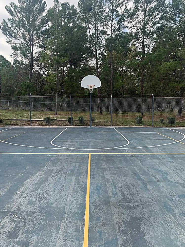 Basketball court needing resurfacing