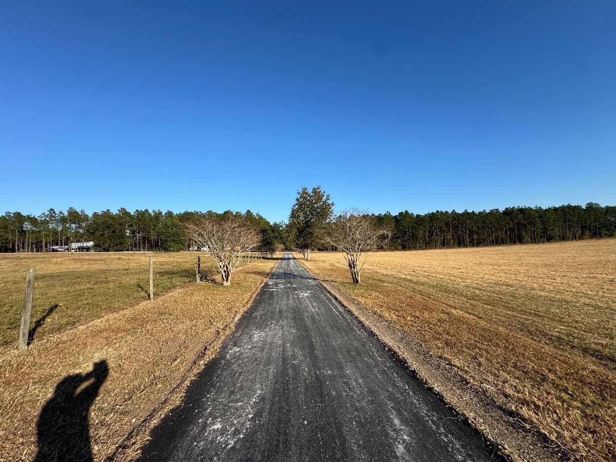 New asphalt driveway section
