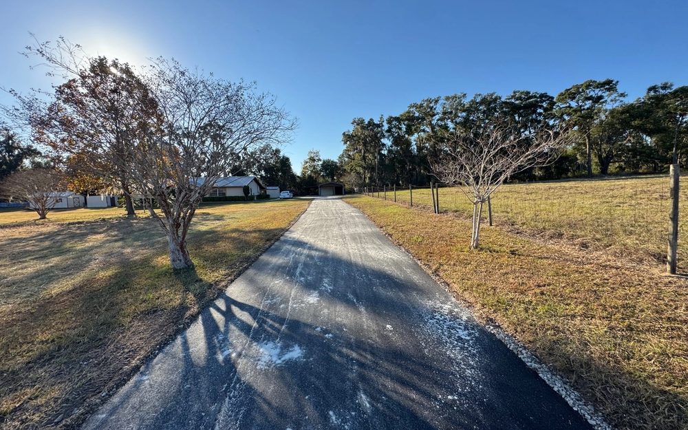 Finished residential asphalt driveway and walkway