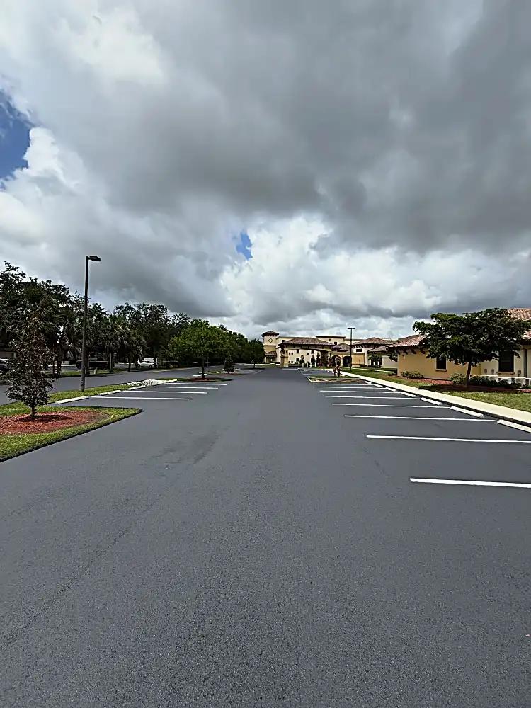 Wide parking lot view with fresh sealcoat