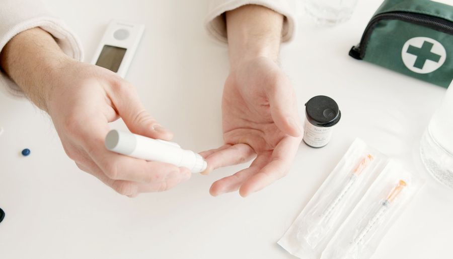 Finger prick to measure Blood Sugar