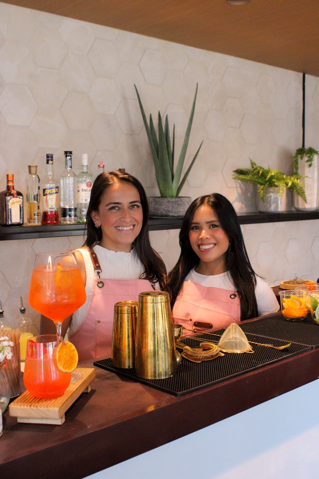 Professional bartender preparing a cocktail during an upscale event