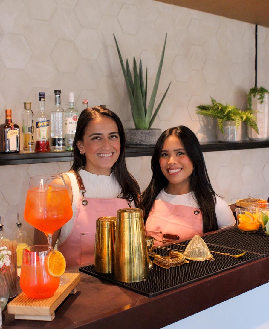 Professional bartender preparing a cocktail during an upscale event