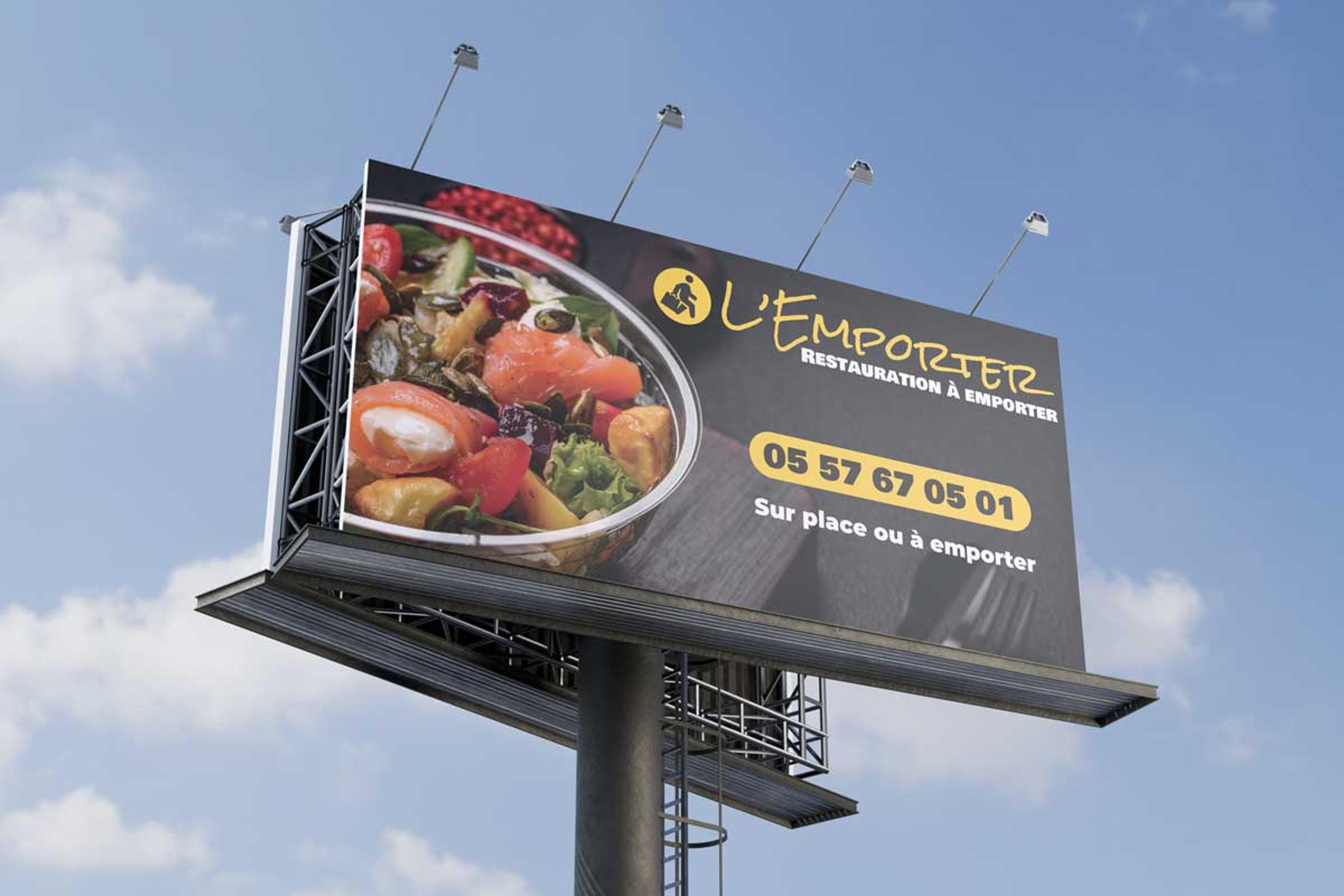 Création de panneau publicitaire pour L’Emporter par l’agence CHOCOLAT NOIR