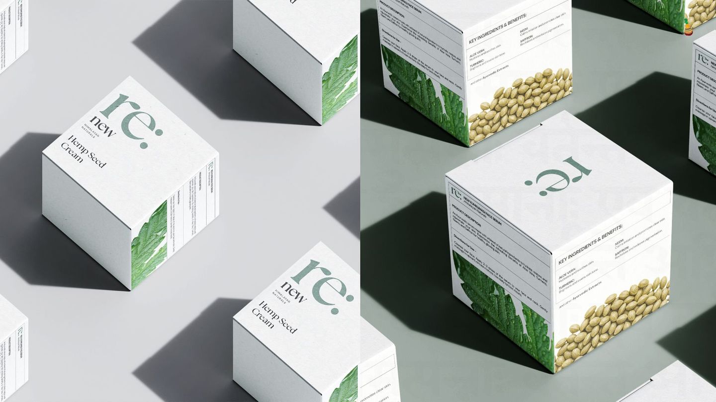 White re: boxes with green leaf panels, arranged on a grey ground