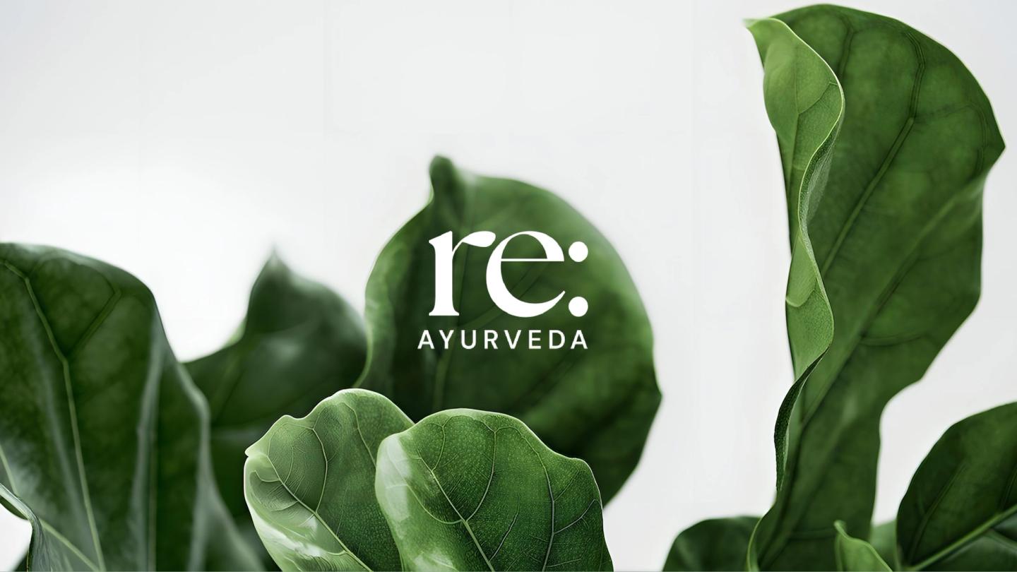 The re: Ayurveda mark in white over large green leaves
