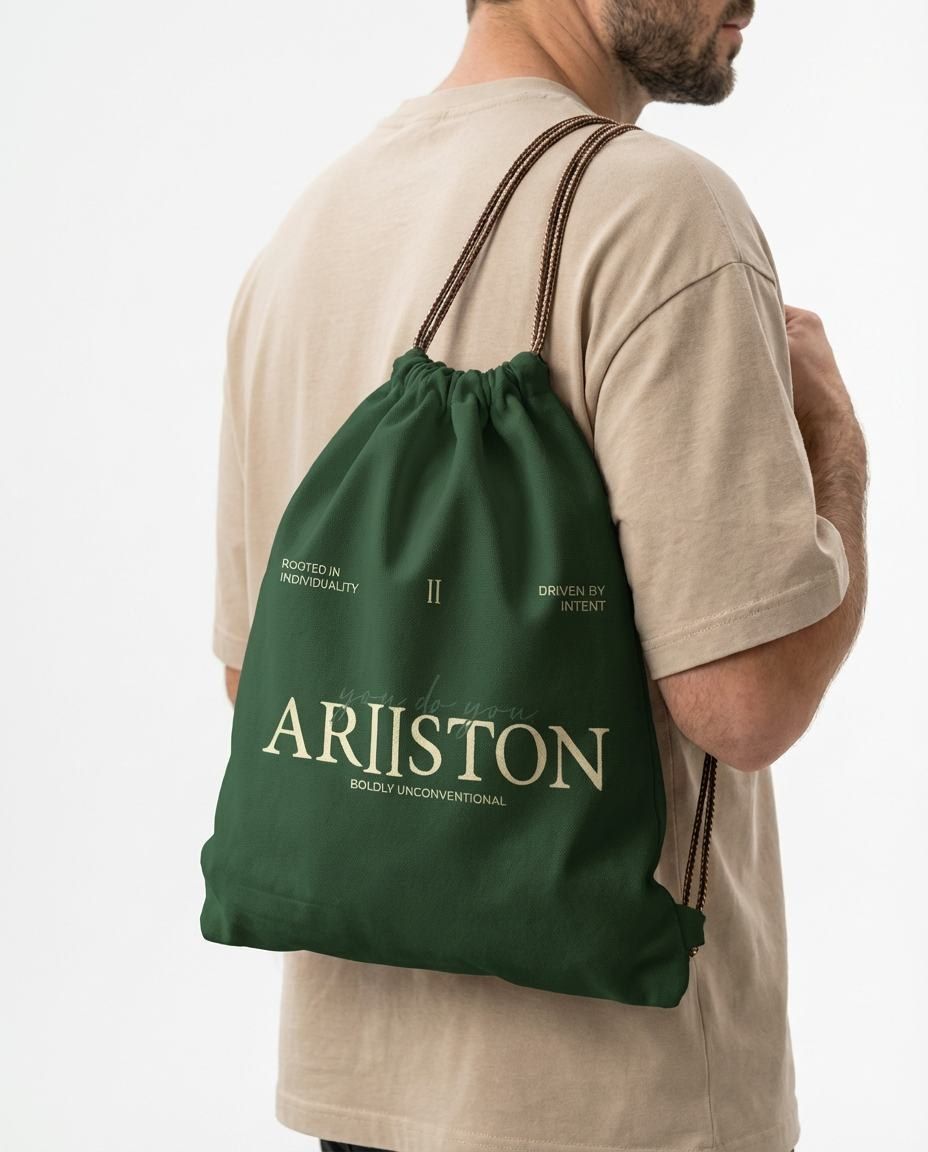 Green Ariiston drawstring bag worn over a shoulder