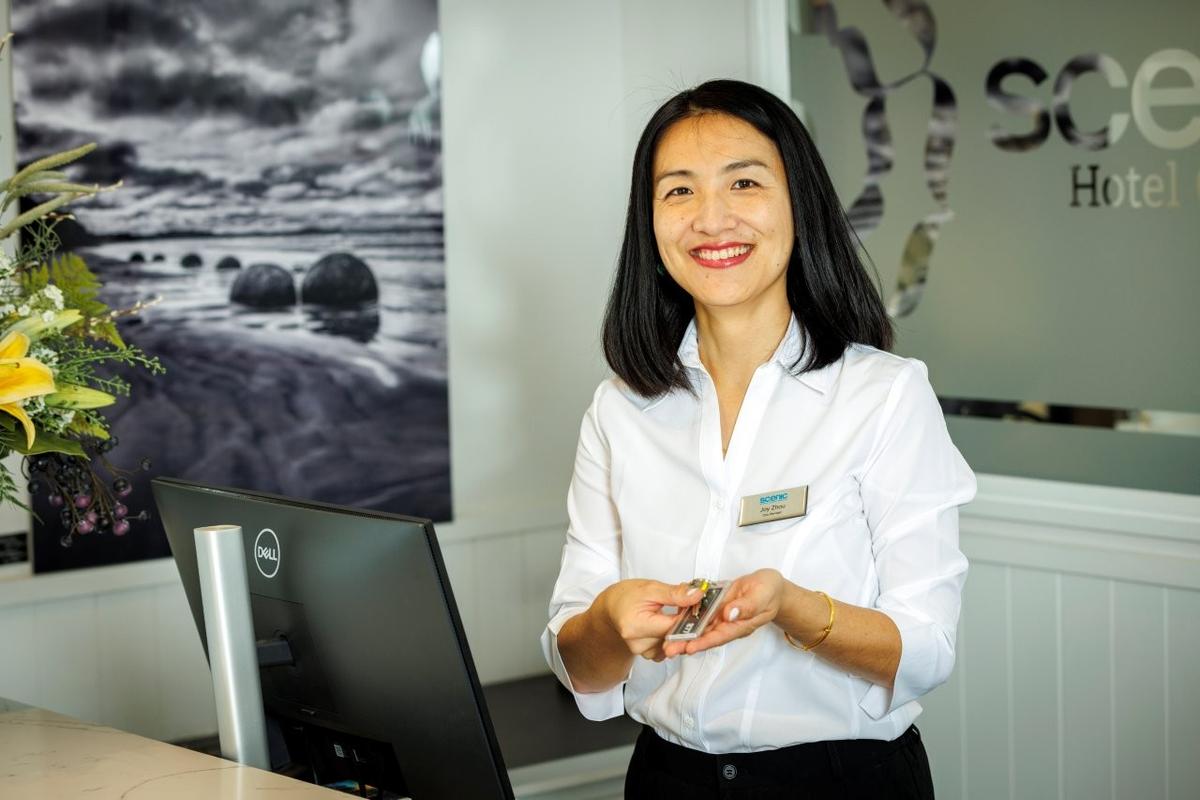 Photo of scenic hotel group receptionist