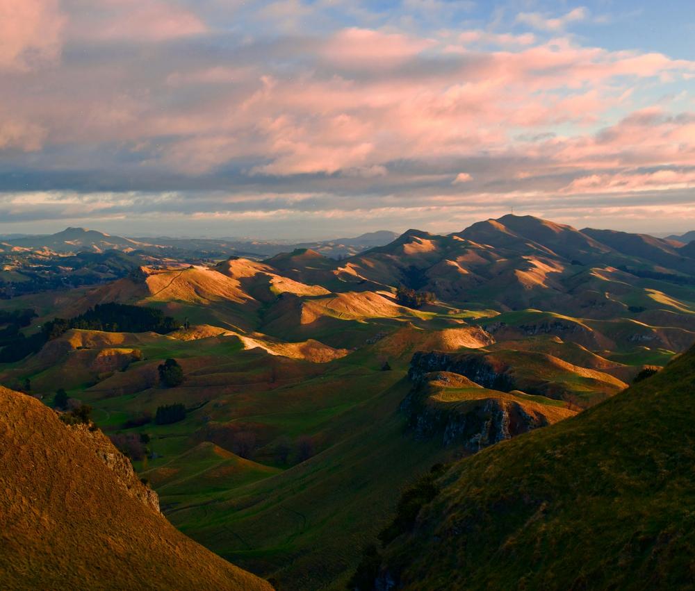 View from te mata peak in hawke's bay of rolling hills and dusk sky View from te mata peak in hawke's bay of rolling hills and dusk sky