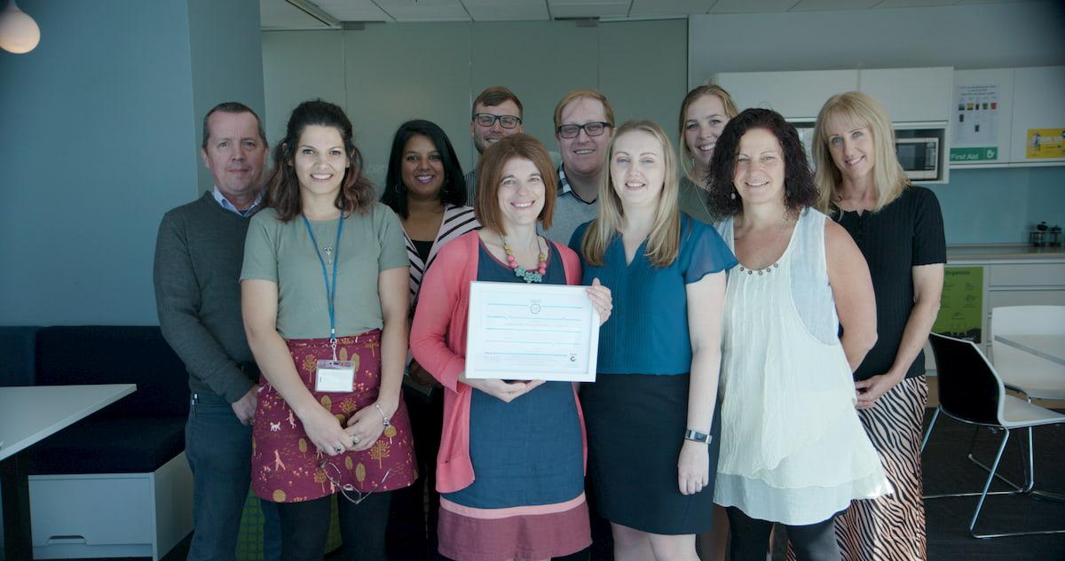 Summerset's Green Team holding their Toitū carbonzero certificate