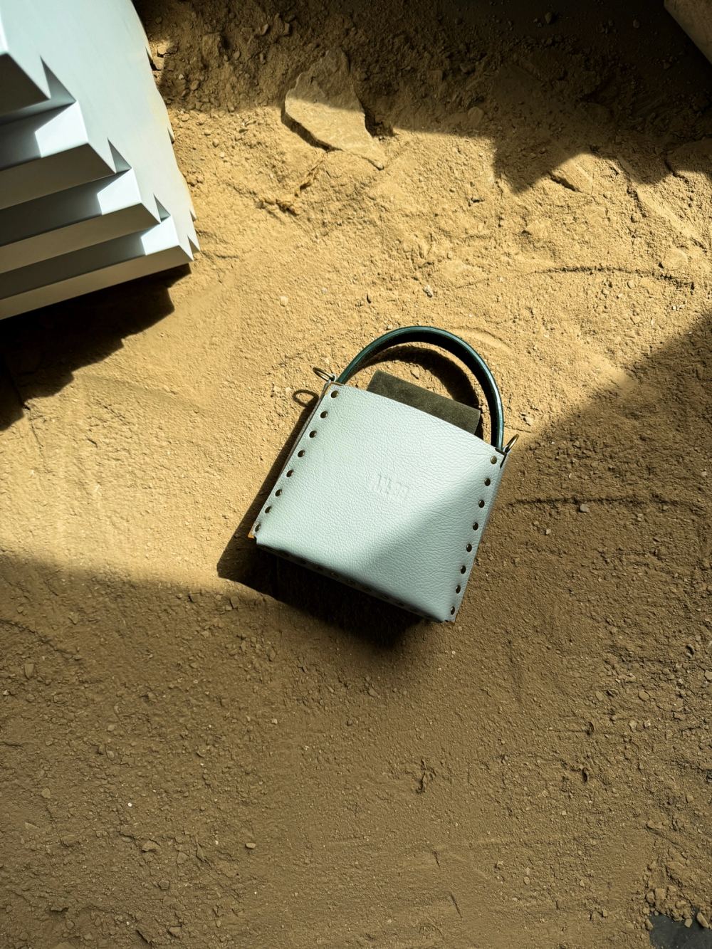 AN:88 · packaging cuir maroquinerie · photographie produit · HUMANO Creative Studio